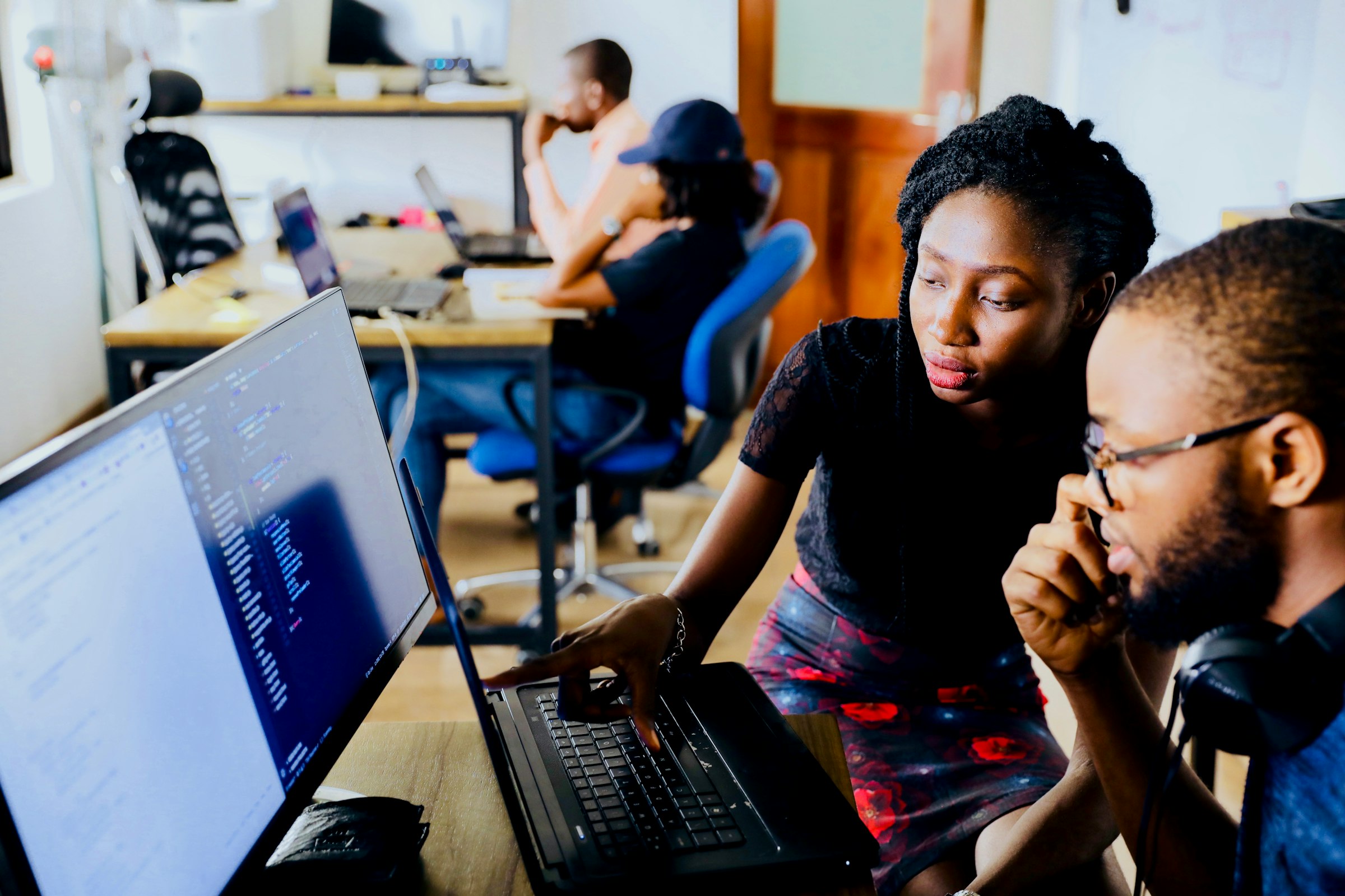 Developers working together in the studio